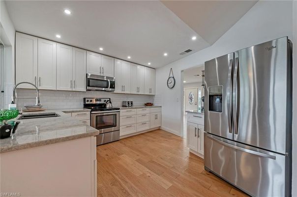 Interior, Kitchen, Recessed Lighting, Stainless Steel Appliances, Wood Texture Flooring