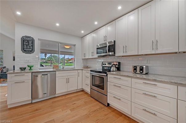 Interior, Kitchen, Recessed Lighting, Stainless Steel Appliances, Wood Texture Flooring