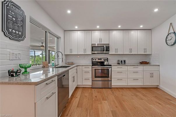 Interior, Kitchen, Recessed Lighting, Stainless Steel Appliances, Wood Texture Flooring