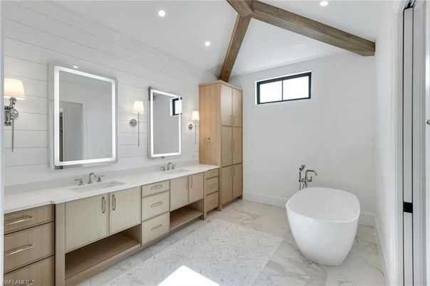 Bathroom, Dual Sink Vanities, Free Standing Baths, Interior, Marble, Recessed Lighting, Wooden Beams