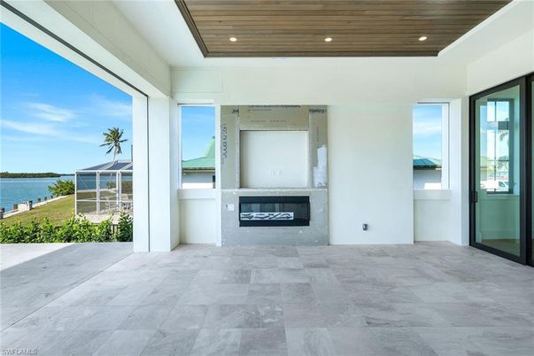 Fireplace, Interior, Recessed Lighting, Water, Wooden Ceilings