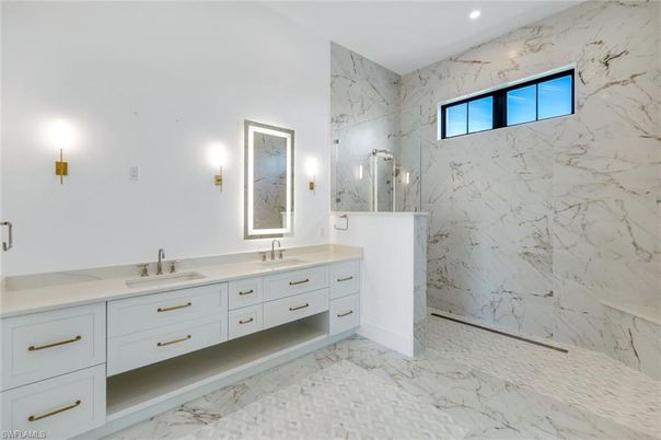 Bathroom, Dual Sink Vanities, Interior, Marble, Marble Walls, Recessed Lighting