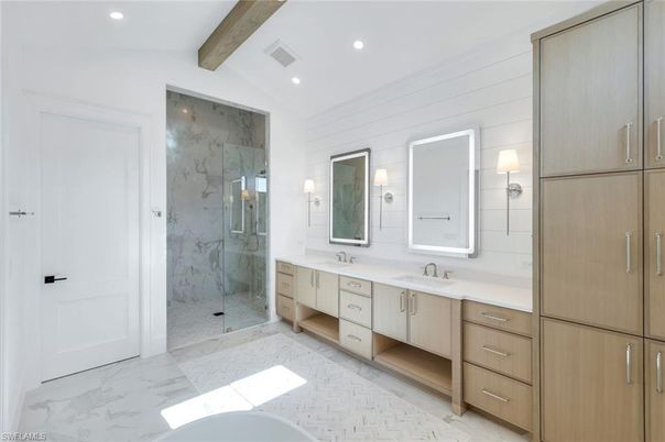 Bathroom, Dual Sink Vanities, Glass Shower, Interior, Marble, Marble Walls, Recessed Lighting, Wooden Beams