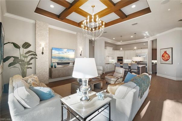 Chandelier, Interior, Kitchen, Living room, Pendant Lights, Recessed Lighting, Stainless Steel Appliances, Wooden Beams, Wood Texture Flooring