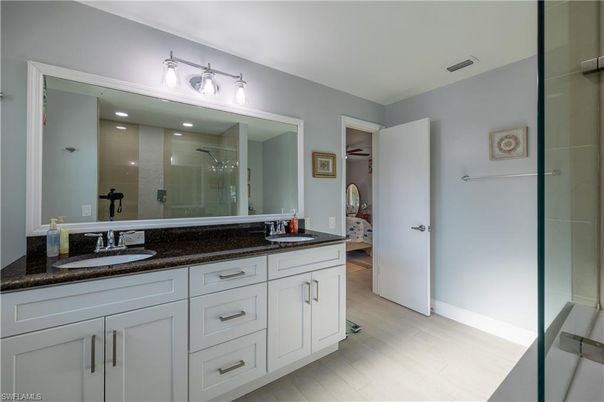 Bathroom, Dual Sink Vanities, Glass Shower, Interior, Wood Texture Flooring