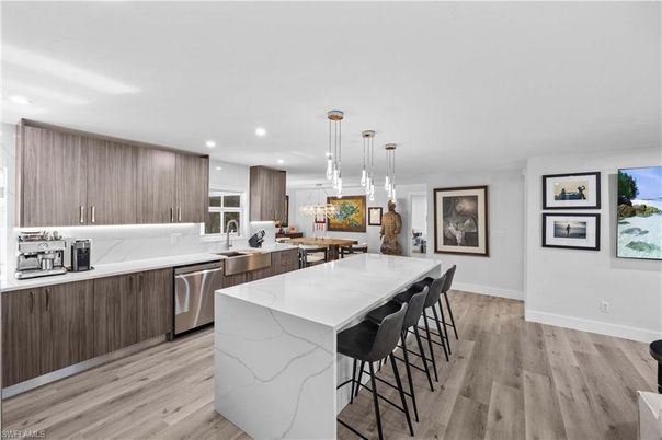 Dining room, Interior, Kitchen, Pendant Lights, Recessed Lighting, Stainless Steel Appliances, Wood Texture Flooring