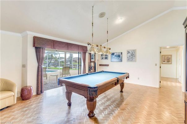 Billiard Table, Chandelier, Game Room, Interior, Pendant Lights, Recessed Lighting, Wood Texture Flooring