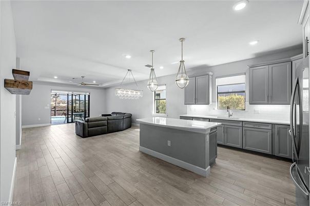 Chandelier, Interior, Kitchen, Living room, Pendant Lights, Recessed Lighting, Wood Texture Flooring