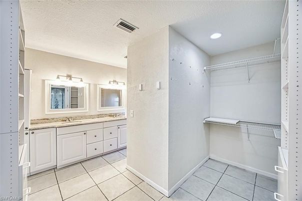 Bathroom, Dual Sink Vanities, Interior, Recessed Lighting, Walk-in Closets