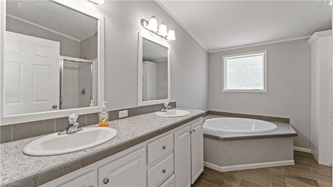 Bathroom, Dual Sink Vanities, Interior, Tile Countertops, Wood Texture Flooring