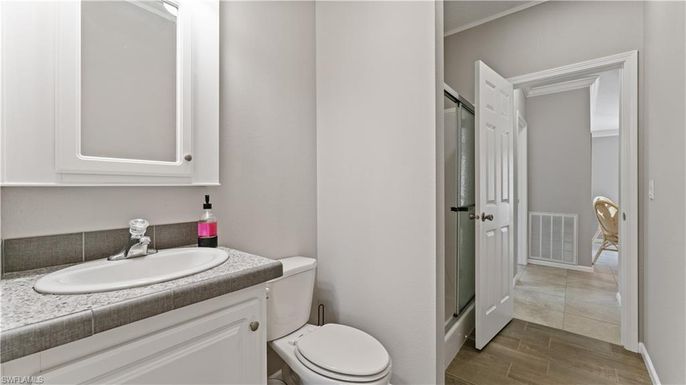 Bathroom, Interior, Tile Countertops, Wood Texture Flooring