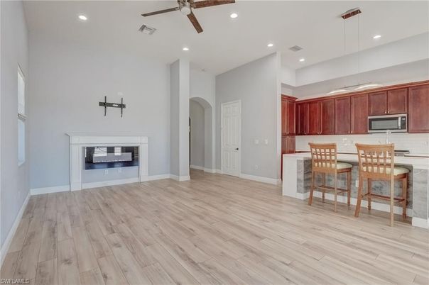 Fireplace, Interior, Kitchen, Pendant Lights, Recessed Lighting, Wood Texture Flooring