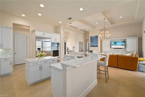 Chandelier, Interior, Kitchen, Pendant Lights, Recessed Lighting, Stainless Steel Appliances, Wood Texture Flooring