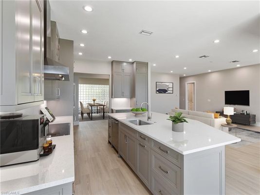 Dining room, Interior, Kitchen, Living room, Recessed Lighting, Stainless Steel Appliances, Wood Texture Flooring