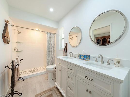 Bathroom, Dual Sink Vanities, Interior, Recessed Lighting, Wood Texture Flooring