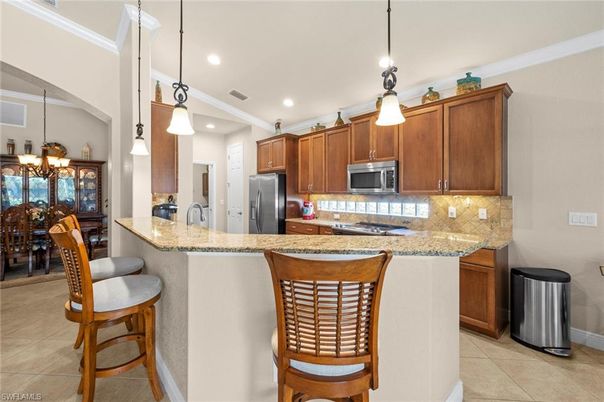 Chandelier, Dining room, Interior, Kitchen, Pendant Lights, Recessed Lighting, Stainless Steel Appliances