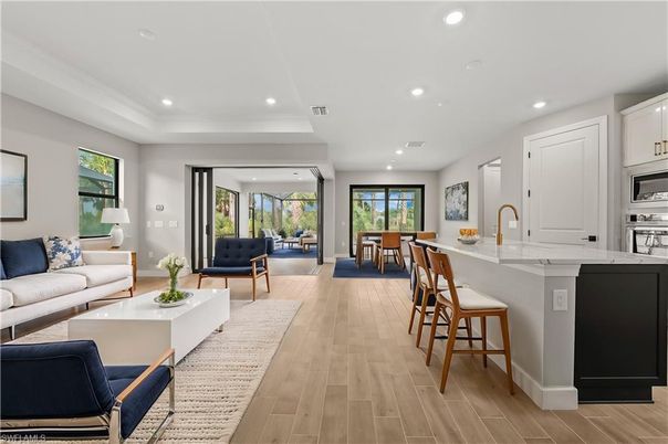 Dining room, Interior, Kitchen, Living room, Recessed Lighting, Stainless Steel Appliances, Wood Texture Flooring