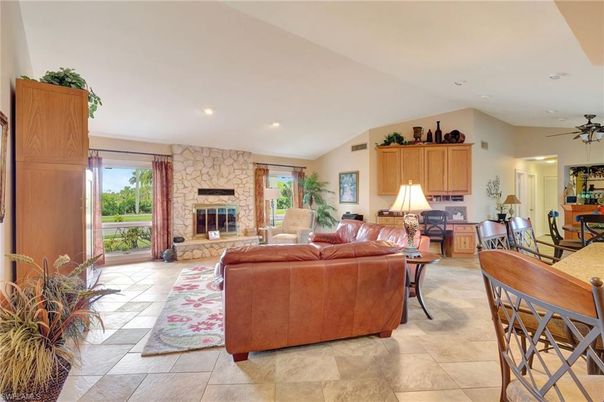 Dining room, Fireplace, Interior, Living room, Recessed Lighting, Stone Walls
