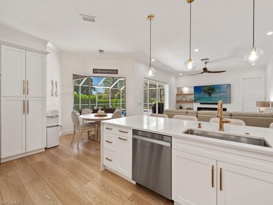 Dining room, Interior, Kitchen, Living room, Pendant Lights, Recessed Lighting, Stainless Steel Appliances, Wood Texture Flooring