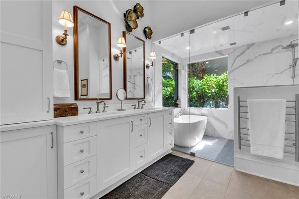 Bathroom, Dual Sink Vanities, Free Standing Baths, Glass Shower, Interior, Marble Walls, Recessed Lighting