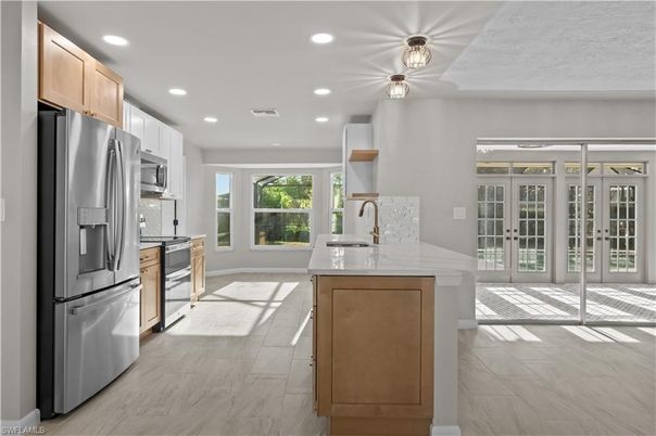 Interior, Kitchen, Marble, Recessed Lighting, Stainless Steel Appliances, Wood Texture Flooring