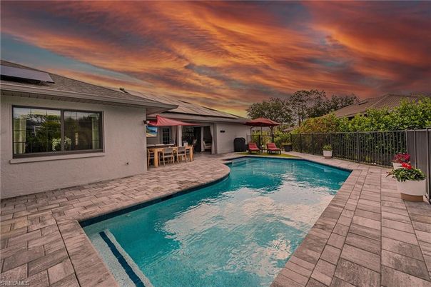 Exterior, Pool, Solar Panels