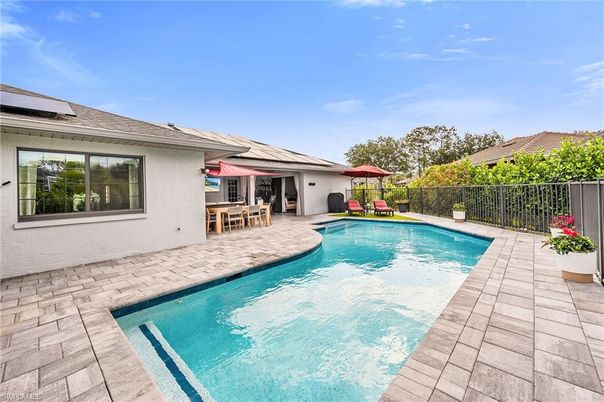 Exterior, Pool, Solar Panels