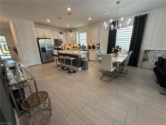 Dining room, Interior, Kitchen, Pendant Lights, Recessed Lighting, Stainless Steel Appliances, Wood Texture Flooring