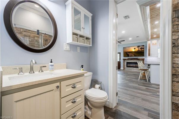Bathroom, Fireplace, Interior, Recessed Lighting, Stone Walls, Wood Texture Flooring