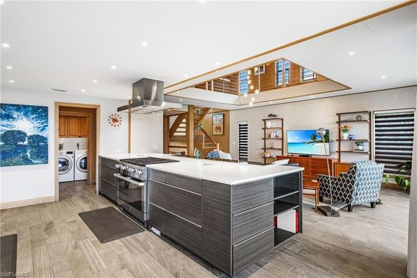 Interior, Kitchen, Recessed Lighting, Stainless Steel Appliances, Washer, Wood Texture Flooring