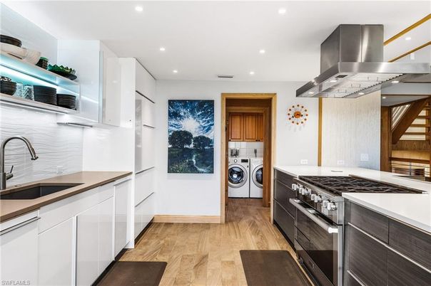 Interior, Kitchen, Recessed Lighting, Utility Closets, Washer, Wood Texture Flooring