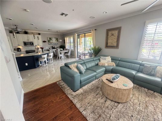 Dining room, Interior, Kitchen, Living room, Pendant Lights, Recessed Lighting, Stainless Steel Appliances, Wood Texture Flooring