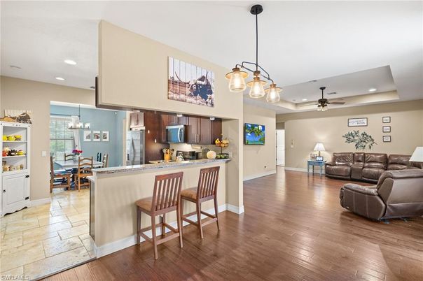 Chandelier, Dining room, Interior, Kitchen, Living room, Pendant Lights, Recessed Lighting, Wood Texture Flooring