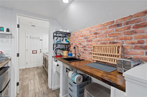 Interior, Kitchen, Recessed Lighting, Stone Walls, Wood Texture Flooring