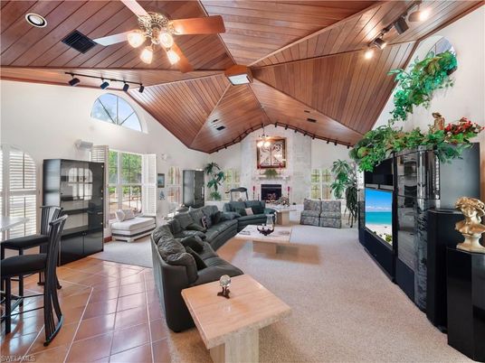 Fireplace, Interior, Living room, Recessed Lighting, Stone Walls, Wooden Ceilings