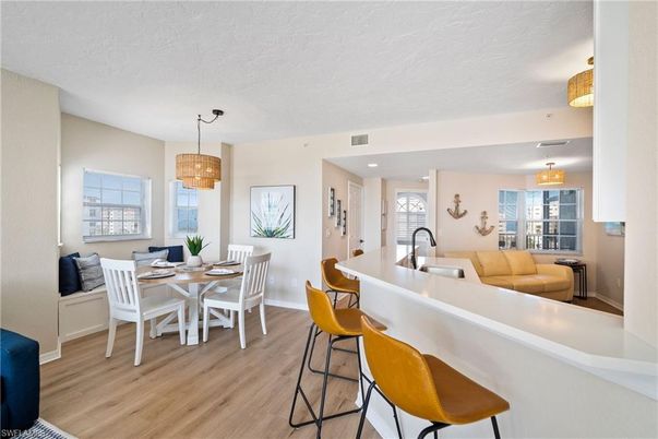 Chandelier, Dining room, Interior, Living room, Pendant Lights, Recessed Lighting, Wood Texture Flooring