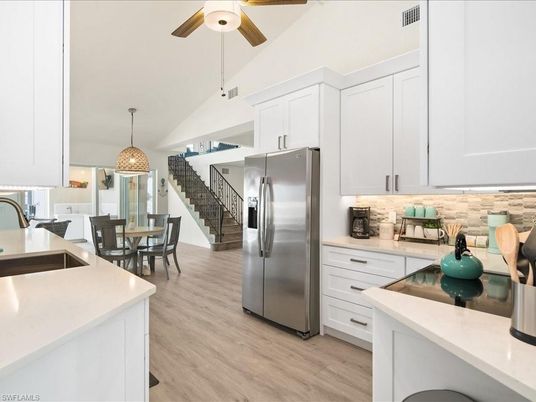 Dining room, Interior, Kitchen, Pendant Lights, Stainless Steel Appliances, Wood Texture Flooring