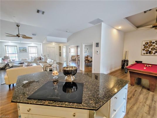 Billiard Table, Dining room, Game Room, Interior, Living room, Recessed Lighting, Wood Texture Flooring