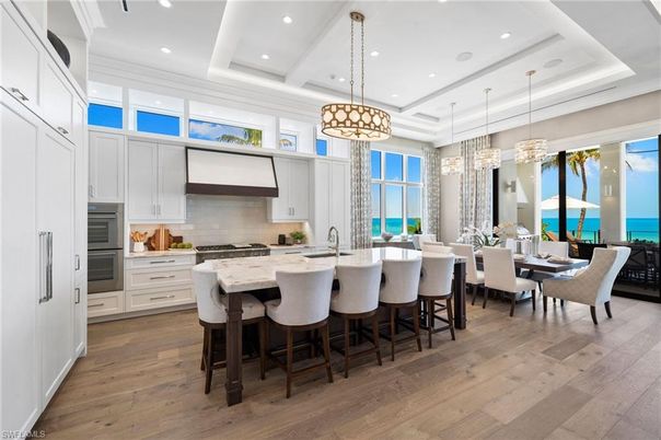 Chandelier, Dining room, Interior, Kitchen, Pendant Lights, Recessed Lighting, Stainless Steel Appliances, Water, Wood Texture Flooring