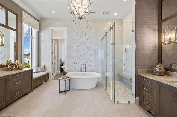 Bathroom, Chandelier, Dual Sink Vanities, Free Standing Baths, Glass Shower, Interior, Pendant Lights, Recessed Lighting, Wood Texture Flooring