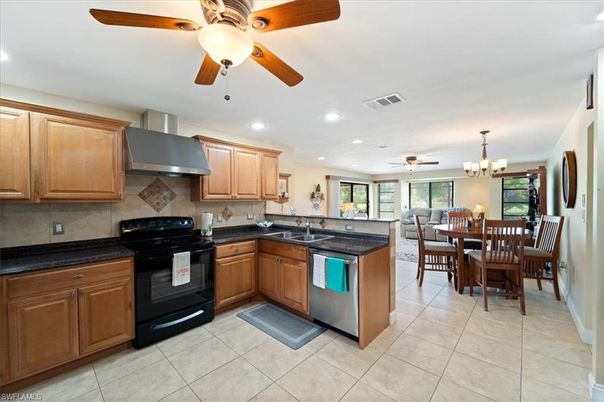 Chandelier, Dining room, Interior, Kitchen, Recessed Lighting, Stainless Steel Appliances