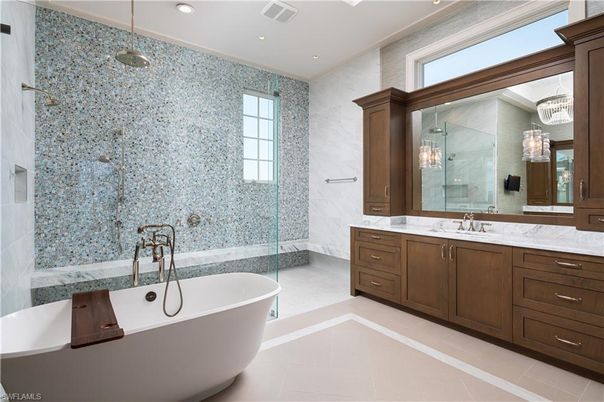 Bathroom, Dual Sink Vanities, Free Standing Baths, Glass Shower, Interior, Marble Walls, Recessed Lighting