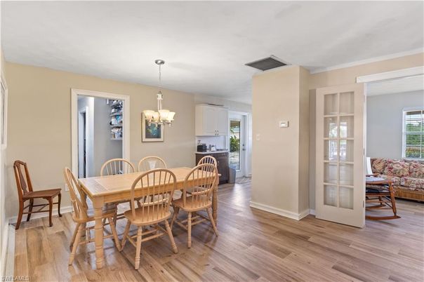 Chandelier, Dining room, Interior, Wood Texture Flooring
