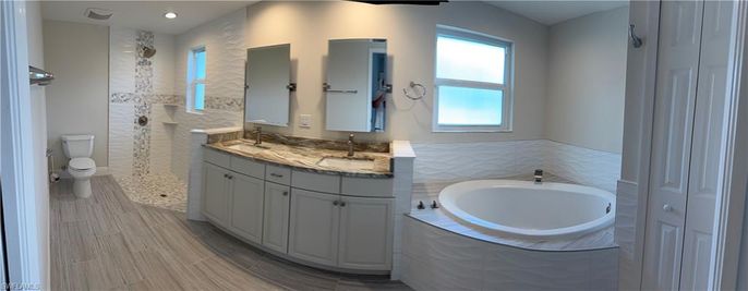 Bathroom, Dual Sink Vanities, Interior, Recessed Lighting, Wood Texture Flooring