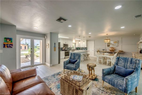 Dining room, Interior, Kitchen, Living room, Pendant Lights, Recessed Lighting, Stainless Steel Appliances, Wood Texture Flooring