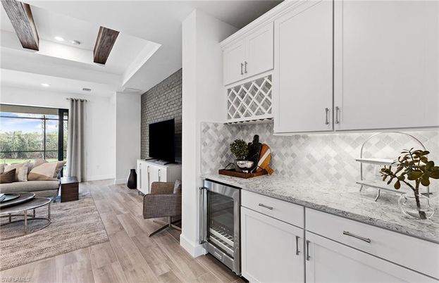 Interior, Kitchen, Living room, Recessed Lighting, Stainless Steel Appliances, Stone Walls, Wooden Beams, Wood Texture Flooring