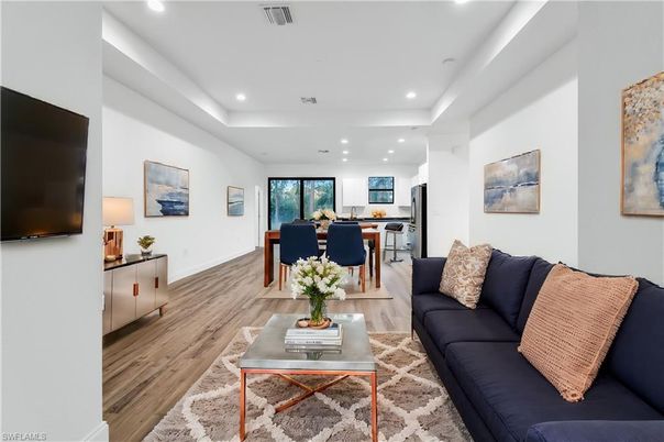Dining room, Interior, Kitchen, Living room, Recessed Lighting, Stainless Steel Appliances, Wood Texture Flooring