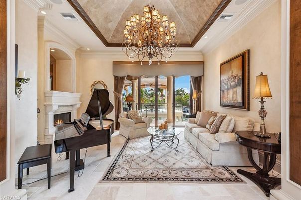 Chandelier, Fireplace, Interior, Living room, Piano, Recessed Lighting