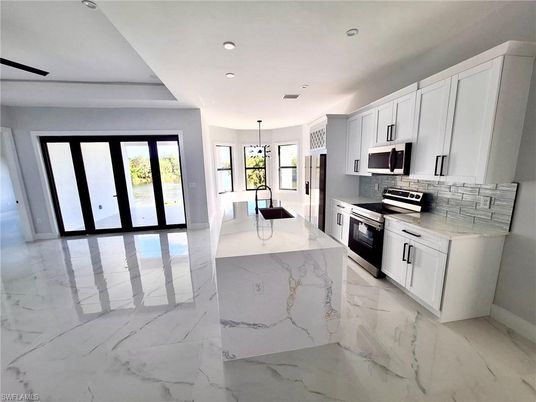 Interior, Kitchen, Marble, Pendant Lights, Recessed Lighting, Stainless Steel Appliances