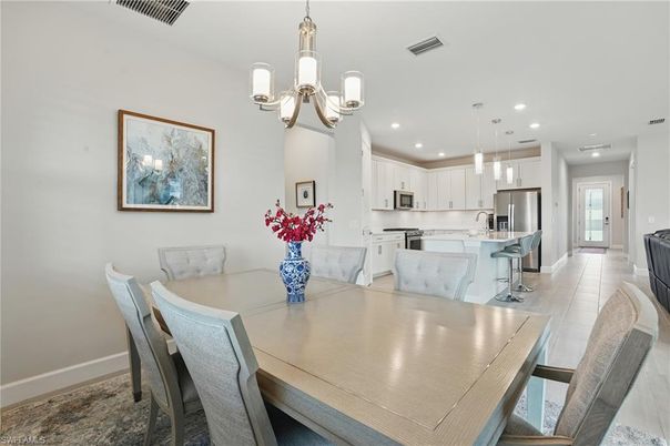 Chandelier, Dining room, Interior, Kitchen, Pendant Lights, Recessed Lighting, Stainless Steel Appliances